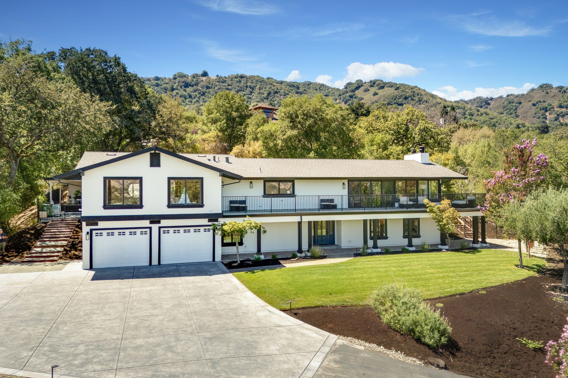 481 Montcrest Place. The front elevation and the garage court at the top of the drive.