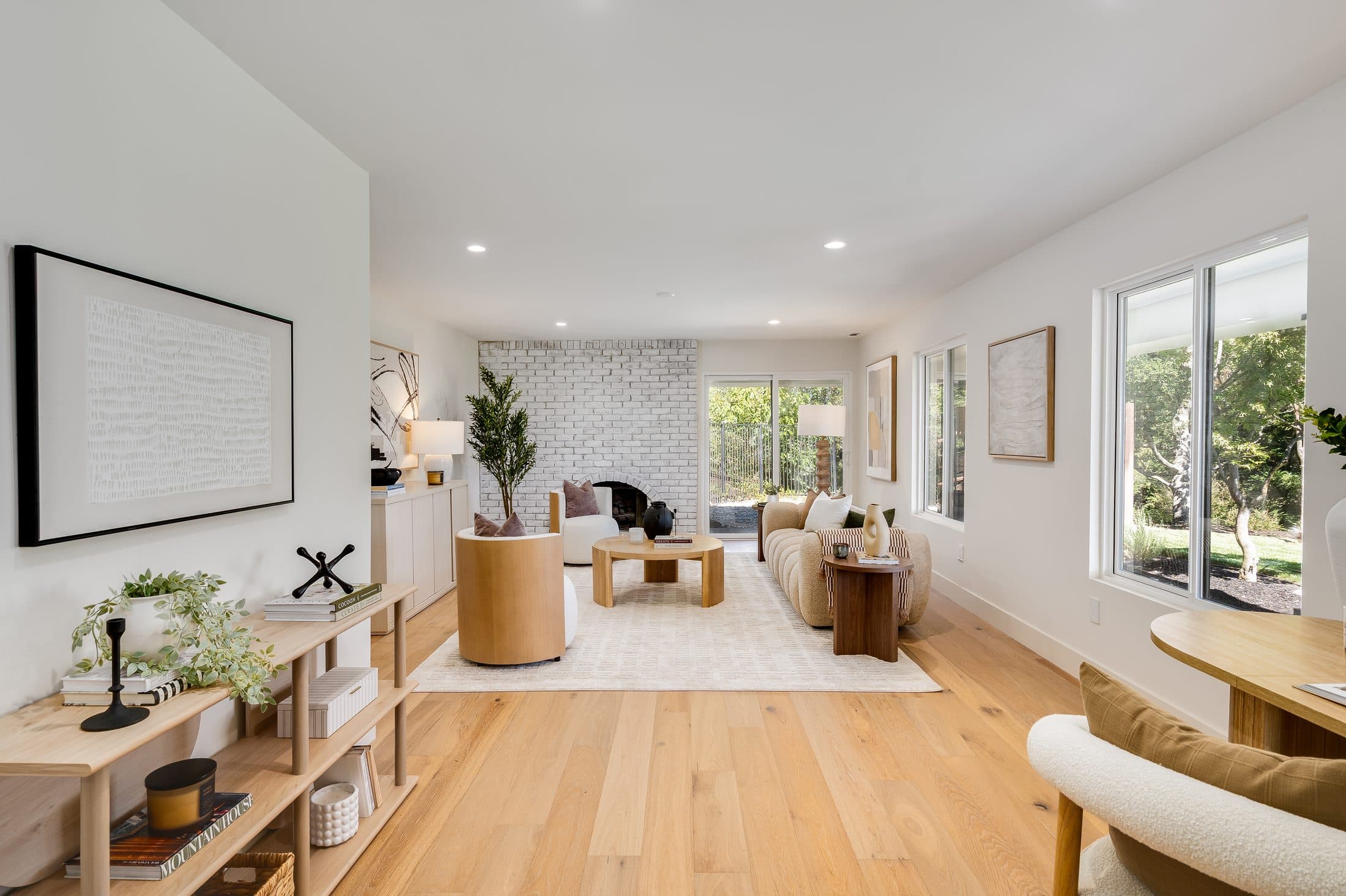 481 Montcrest Place. The lower living room along its full length, glazed to the terrace.