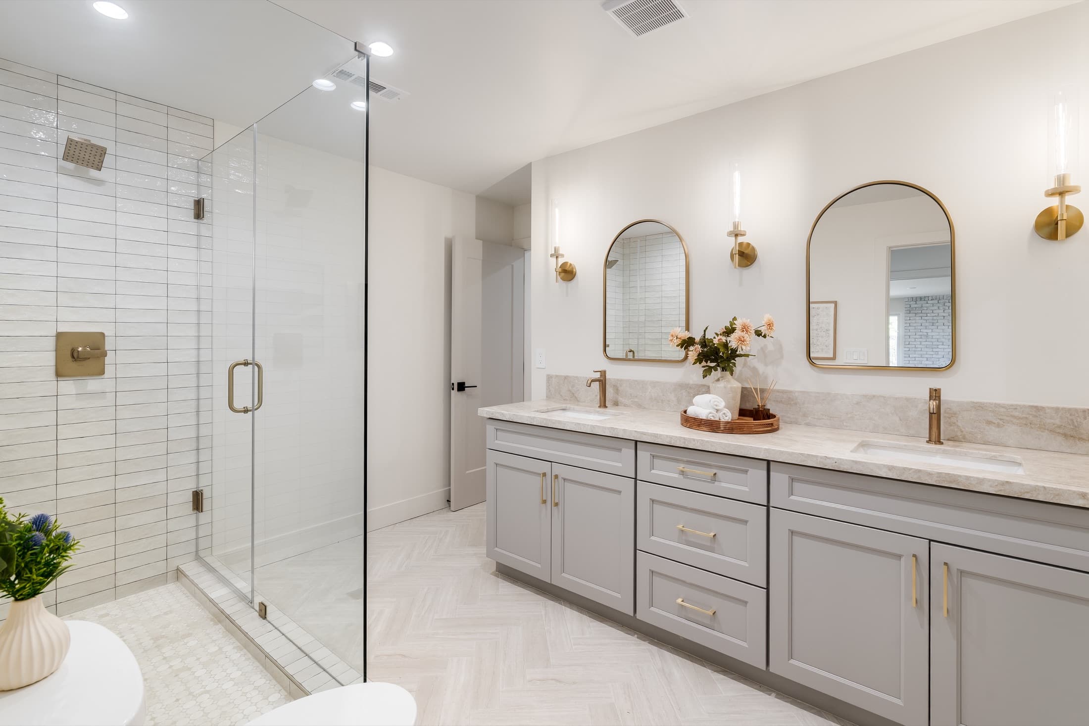 481 Montcrest Place. A full bath with a glazed walk-in shower and a stone vanity.