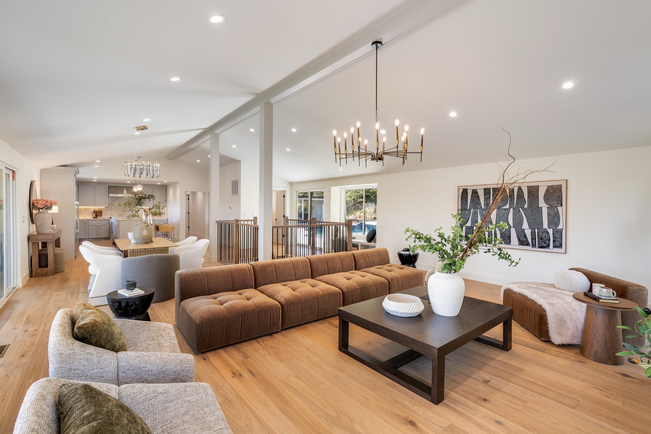 481 Montcrest Place. Living, dining and kitchen reading as one room the length of the upper floor.