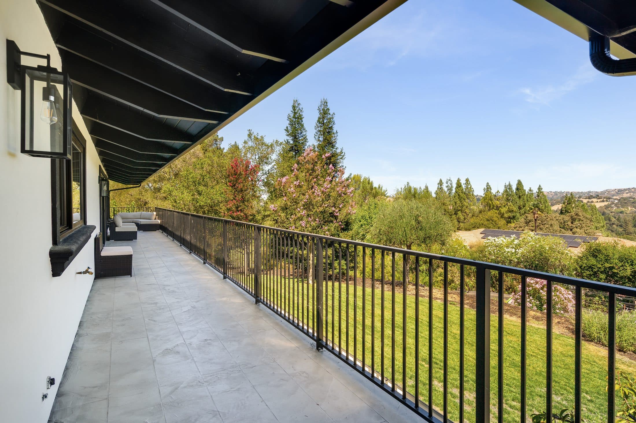 481 Montcrest Place. The covered deck running the length of the upper floor.