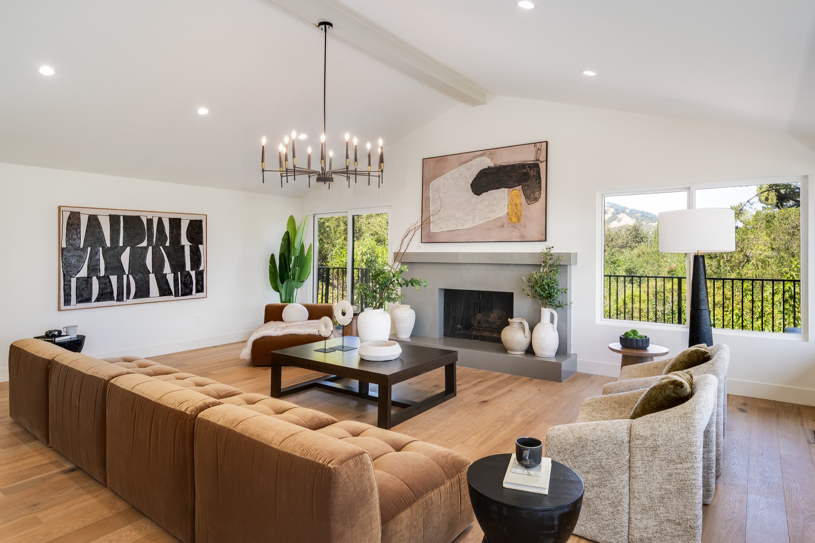 The living room at 481 Montcrest Place, beneath the vaulted ceiling.