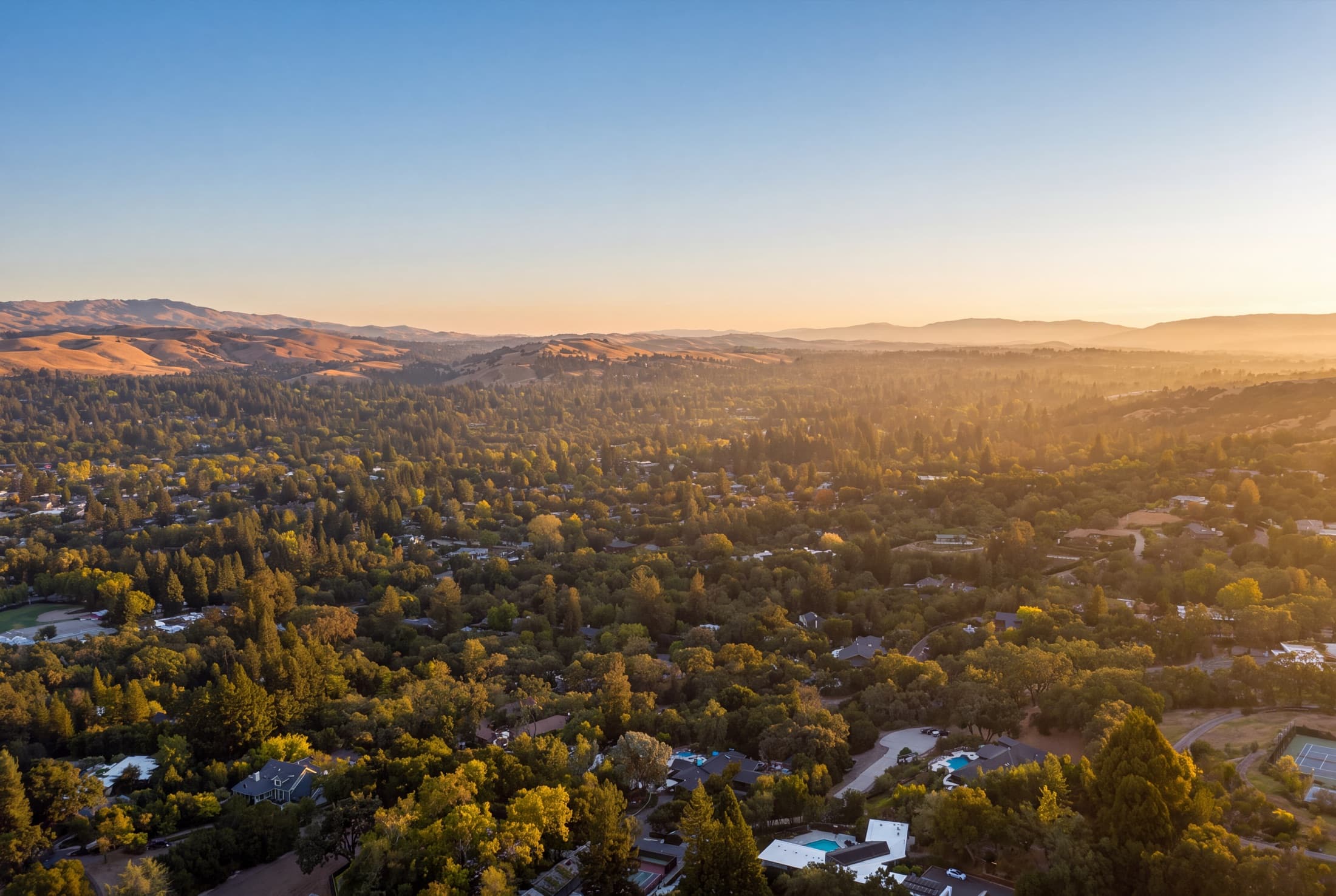 West side Danville from the air, houses set among oaks below the ridgeline.